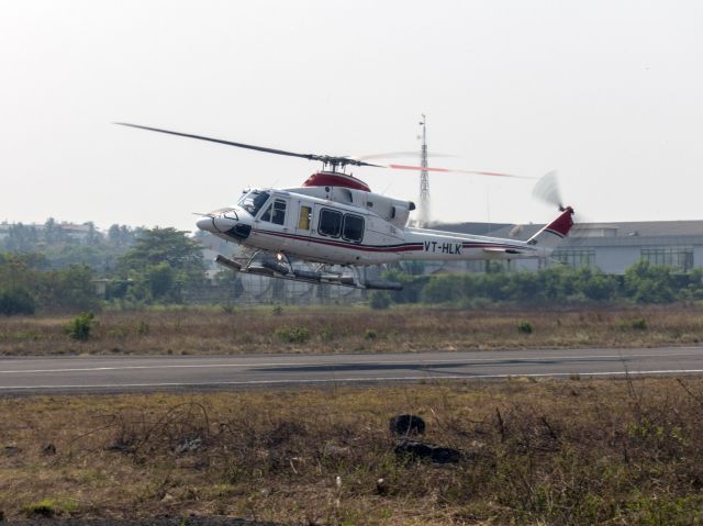 VT-HLK — - 25 MAR 2018 in India. Busy heliport serving the offshore oil industry.