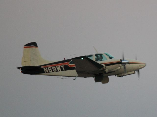 Beechcraft Travel Air (N69WT) - Airborne off of 20L at PDK on 02/16/2011