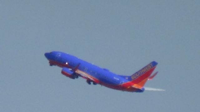 Boeing 737-700 (N296WN) - Departing runway 2R.