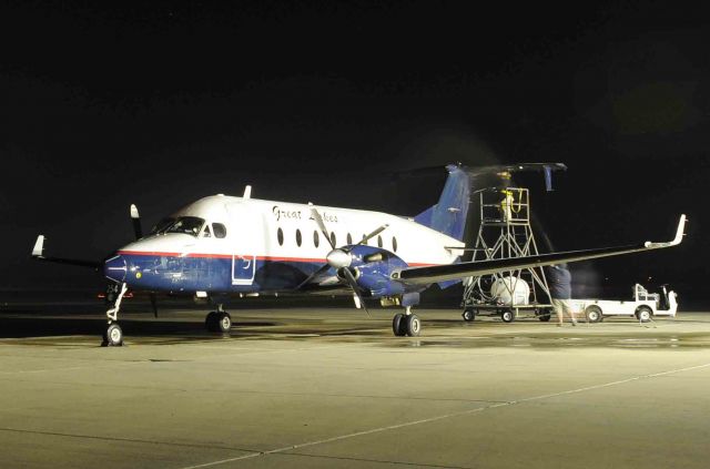 Beechcraft 1900 (N254GL) - Early morning de-icing on the Great Lakes Beechcraft 1900. Temp was down to 31 degrees!!!