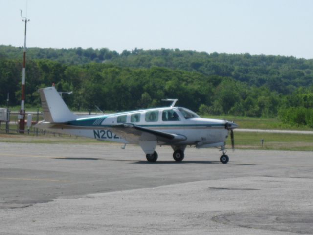 Beechcraft Bonanza (36) (N2022N) - Taxiing back to its hangar.