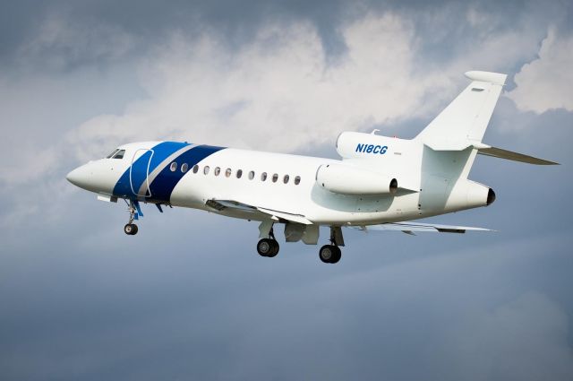 Dassault Falcon 2000 (N18CG) - Departing Hickory Rwy 6 with weather to the southeast.12.Jul.2010