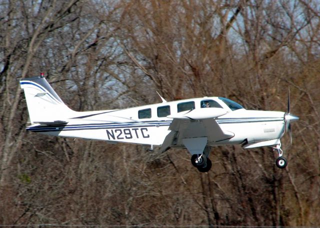 Beechcraft Bonanza (36) (N29TC) - About to touch down on runway 14 at Shreveports Downtown Airport.