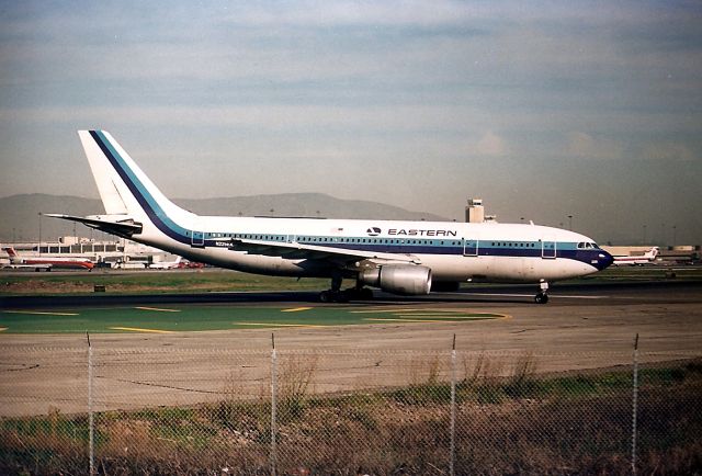 Airbus A300F4-200 (N225EA) - KSFO - Eastern A300-B4 headed to the delay pad at SFO - this late 1980 s photo shows the seldom used delay pad as TWA 767 200 N602TW needed to go 1st .