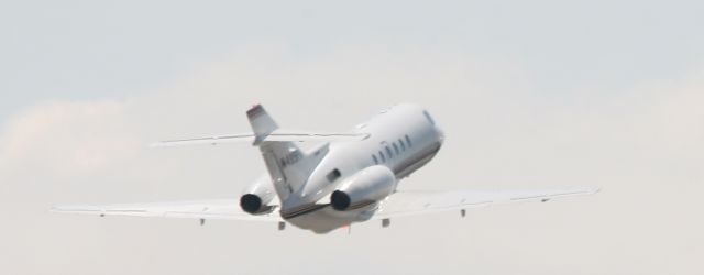 Hawker 800 (N499PA) - A look through the long lens.  Beautiful weather 