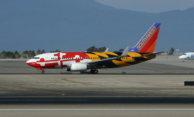 Boeing 737-700 (N214WN) - KLAS - Maryland Logojet departing Las Vegas 25R