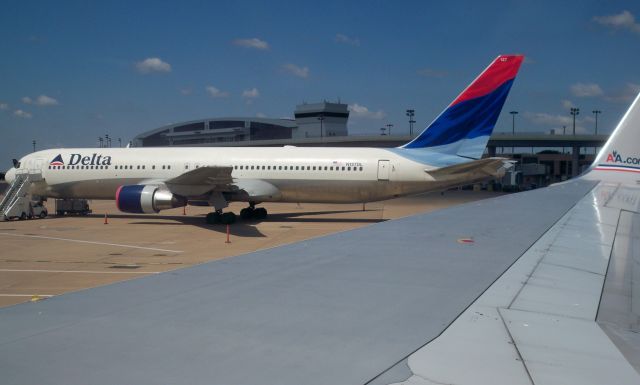 BOEING 767-300 (N127DL) - DL 767-332 N127DL at DFW seen from AA 757-223 N186AN on August 29, 2009.