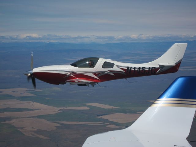 Lancair Legacy 2000 (N145JG) - Formation flying with a Lancair IV over Washington state