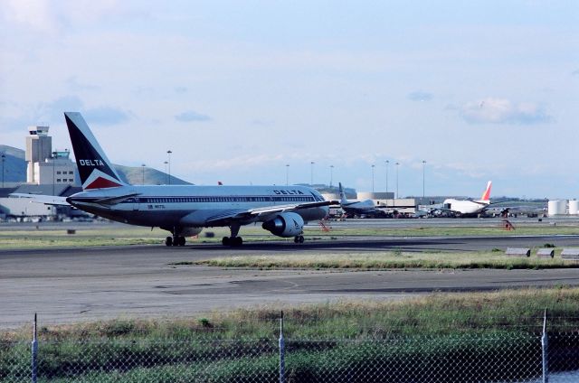 Boeing 757-200 (N617DL) - KSFO - Delta 757 set to depart runway 1R - photo from the long closed Millbrae Ave Airpark,