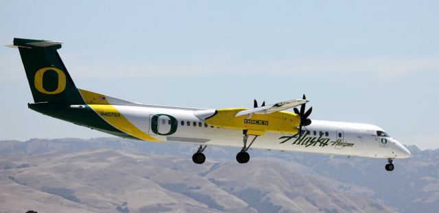 de Havilland Dash 8-100 (N407QX) - Arrival, landing 12R  06-05-2015 .. This image was titled, "One Shot Wonder" by a friend, because of how it turned out, and I only had one opportunity to capture it, at the time of this arrival