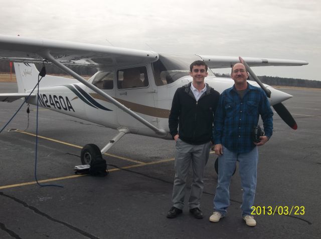 Cessna Skyhawk (N2460A) - AFTER THE FLIGHT. ME 0N THE RIGHT IN THE BLUE AND MY INSTRUCTOR.