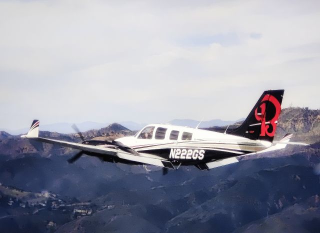 Beechcraft Baron (58) (N222GS) - Captured in slow flight over the Santa Monica Mountains. 
