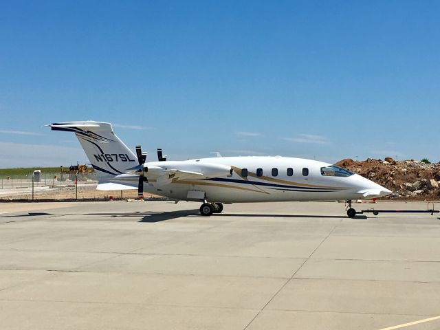 Piaggio P.180 Avanti (N167SL) - New hangars under construction behind.