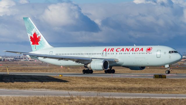 BOEING 767-300 (C-FPCA) - AC737 proceeds to line up on runway 23 and depart to San Francisco