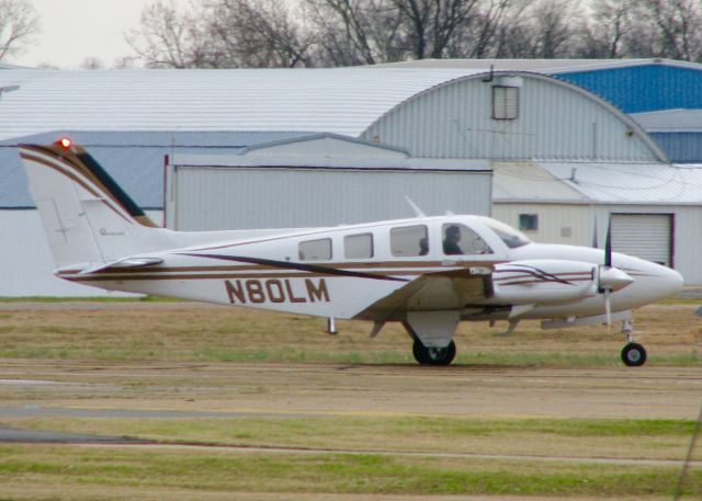 Beechcraft Baron (58) (N80LM) - At Downtown Shreveport.
