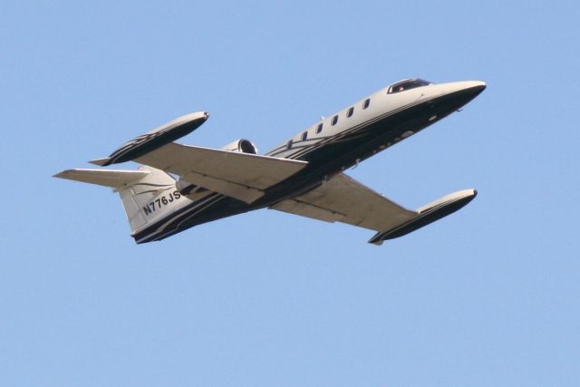 Learjet 35 (N776JS) - N776JS departs Runway 14 at Sarasota-Bradenton International Airport enroute to Chicago Executive Airport