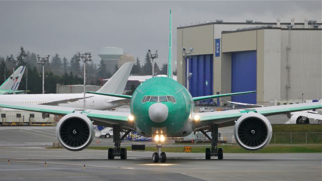 BOEING 777-300 (9V-SNA) - BOE296 taxis onto Rwy 16R for a fast taxi test on 2/10/15. (ln 1279 / cn 42240).