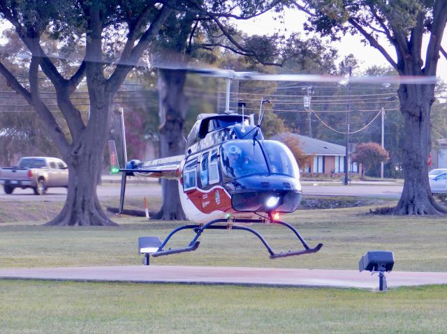 Bell JetRanger (N539AE) - Air Evac 87 at Bolivar Medical Center landing on the helipad after waiting for Pafford Air One Echo to move