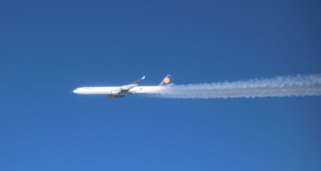 Airbus A340-600 — - 12/7/21 on board Austrian B772 OE-LPC passing Lufthansa somewhere south of Greenland