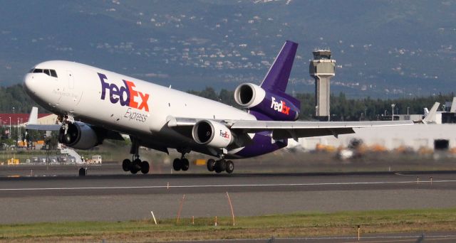 Boeing MD-11 (N586FE) - A 1991 model McDonnell Douglas MD-11(F) departing Anchorage International Airport - June 8, 2022.