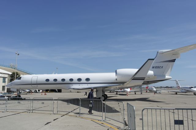 Gulfstream Aerospace Gulfstream V (N105CX) - Being pushed by a Pushback onto taxiway at Oakland International Airport in Oakland, California on April 13, 2015.