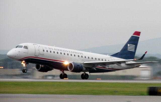 Embraer 175 (N111HQ) - ERJ-175 taking off on runway 17 at KMHT