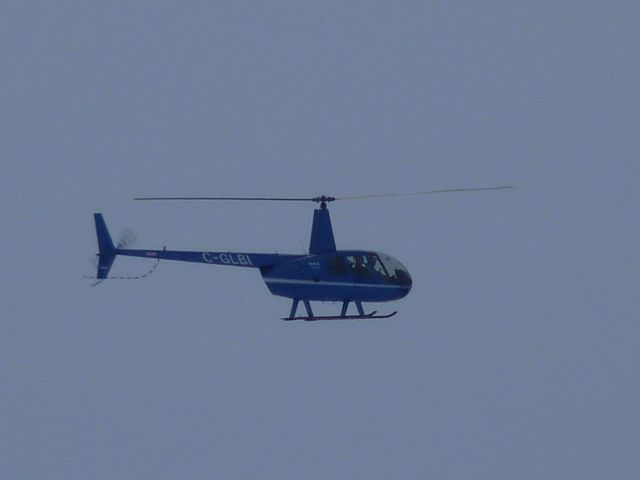 Robinson R-44 (C-GLBI) - preparing to land at Government Hangar Ottawa