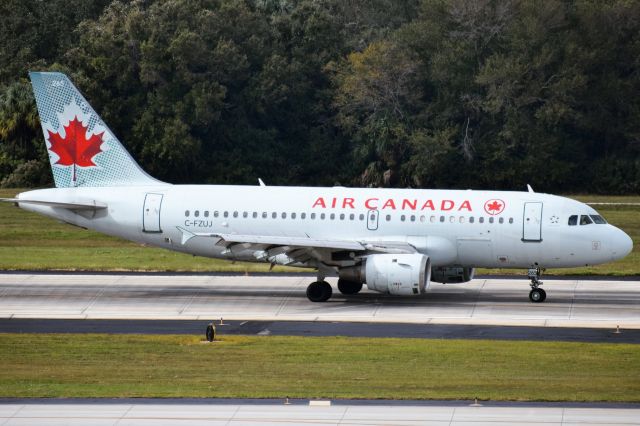 Airbus A319 (C-FZUJ) - ACA938 arriving into Tampa from Toronto (YYZ)br /br /• Delivered to Air Canada September 1997br /• 14 Business Class (2×2) / 106 Economy (3×3)