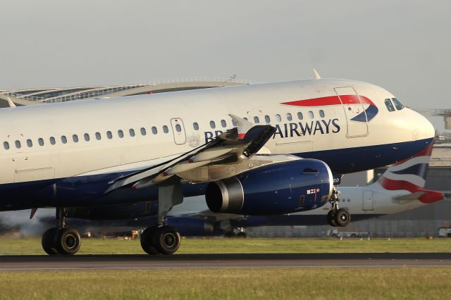 Airbus A320 — - Landing runway 027R at LHR.