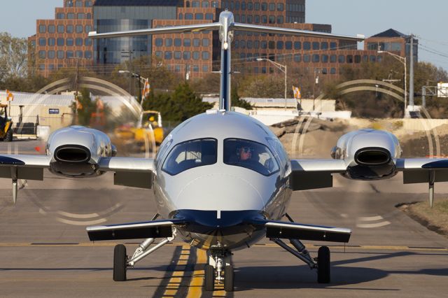 Piaggio P.180 Avanti (N615CJ) - Always nice to capture props heading to taxiway Bravo for parking.