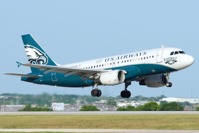 Airbus A319 (N709UW) - 22 arrival, one of three specials May 18, 2014