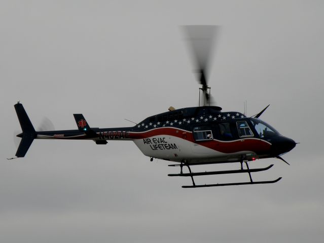 Bell TwinRanger (N402AE) - Air Evac Lifeteam 88 (N402AE) leaving the ramp at TAC Air, the FBO at Blue Grass Airport (KLEX) returning to their base at Harlan, KY....