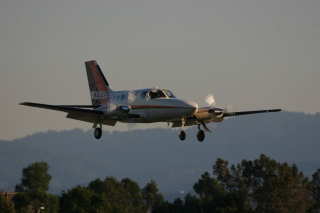 Cessna Chancellor (N414EE) - landing at Palo Alto Airport - photo taken from Baylands Park