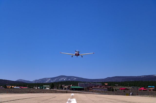 Piper Saratoga (N624DP) - Piper Saratoga N624DP on a low approach for runway 35 in Angel Fire, New Mexico (KAXX)