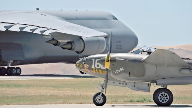 Lockheed P-38 Lightning (N138AM) - Lockheed C5 gets the attention of Planes of Fame's Lockheed P-38J at Travis Air Force Base's Open House, May 15, 2022