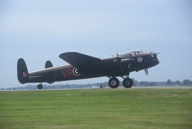 Avro 683 Lancaster (DRK726) - AVRO LANCASTER,CYHM/YHM Taken during picture day at Hamilton Airport during Airshow weekend. Picture taken in late 1990s.