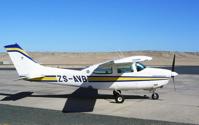 Cessna Centurion (ZS-AVB) - At Luderitz, Namibia. Sand dunes right next to the airport.