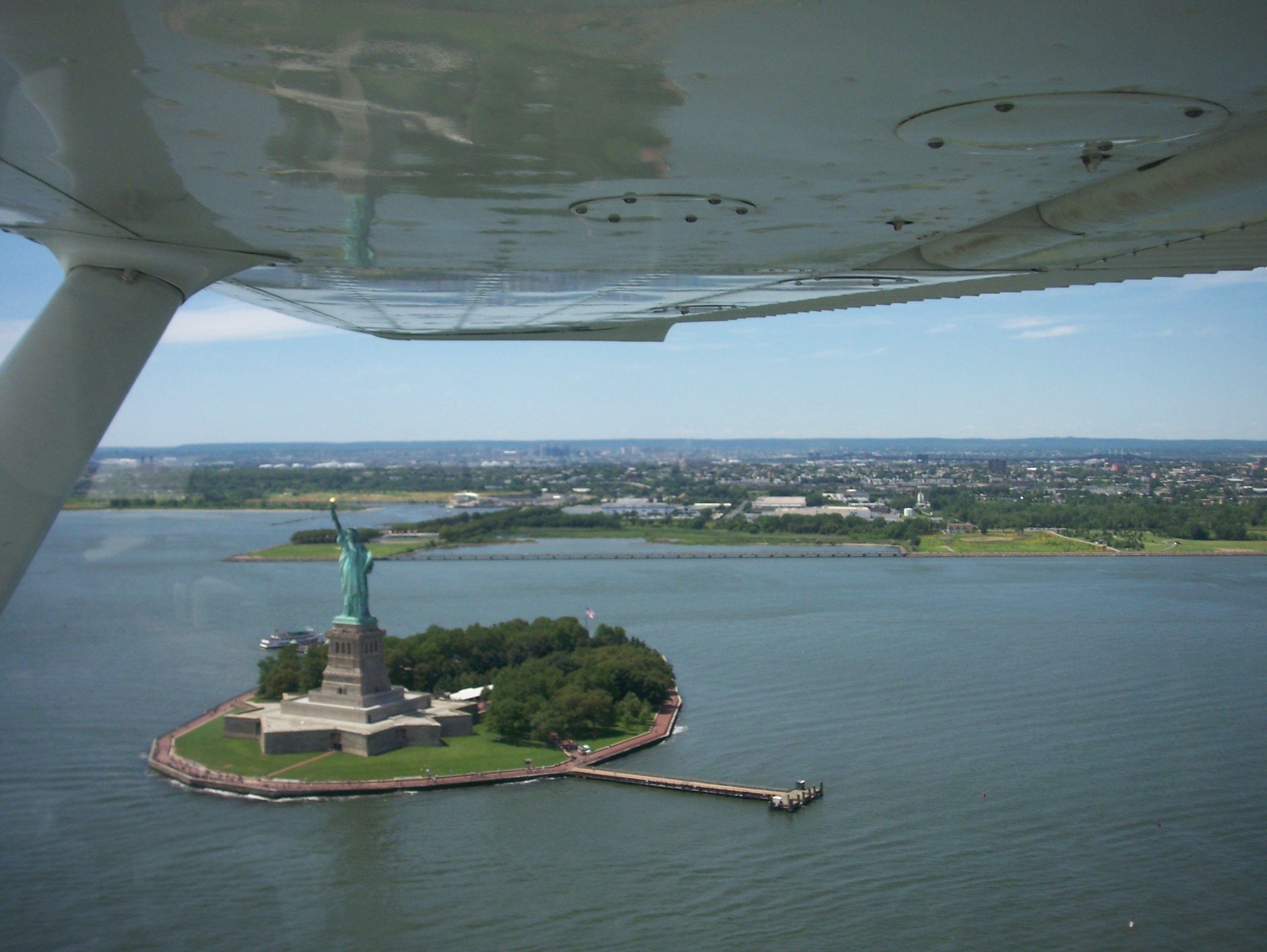 Cessna Commuter (N1319Q) - This is N1319Q Over our favorite Copper Lady. July 10 2008