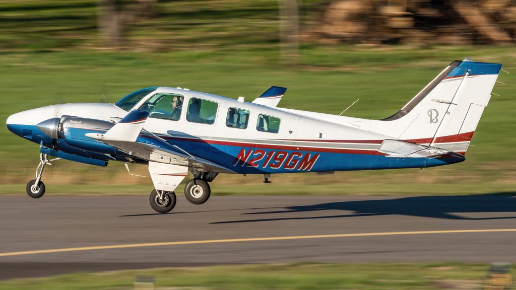 Beechcraft Baron (58) (N219GM) - N219GM lifting off of College Park Airport's runway 33 for a flight to Clarksburg