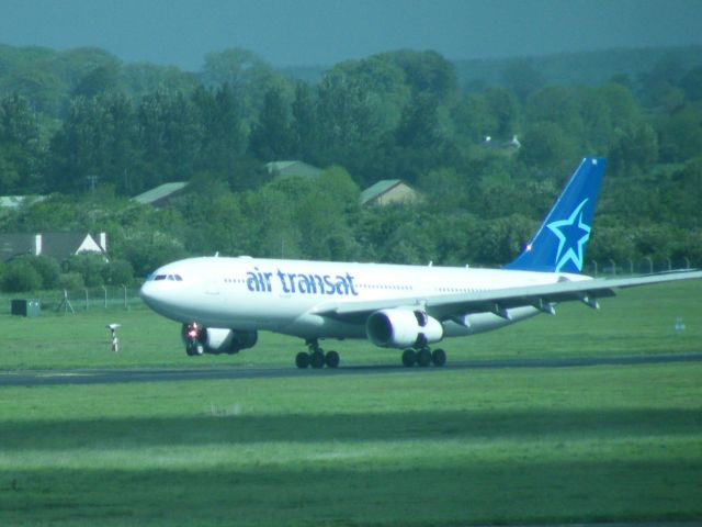 Airbus A330-300 (C-GITS) - C-GITS AIRBUS 330 ARR EINN AS   TSC 231 ON 10-05-2011