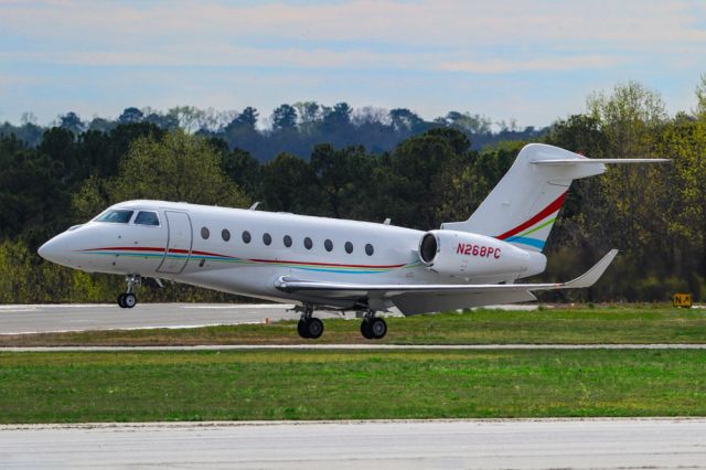 IAI Gulfstream G280 (N268PC) - N268PC is a Gulfstream G280 seen here about to touch down at Atlanta's PDK executive airport. I shot this with a Canon 200-400mm F4 lens at the focal length of 335mm. Camera settings were 1/2500 shutter, F5.6, ISO 320. Please check out my other aviation photography. Votes and positive comments are greatly appreciated. Inquiries about prints or licensing of this photo can be sent to Info@Flews.com