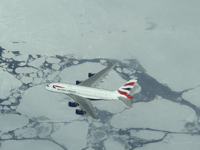 Airbus A380-800 — - Taken from B787 flight deck on an iPhone 15 pro.   A380 was 2000’ below.  East coast of Greenland. 