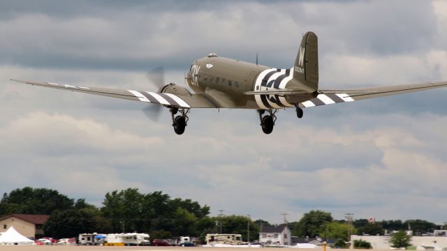 Douglas DC-3 (N88874) - C-47 "Thats all Brother" climbing out of Oshkosh.