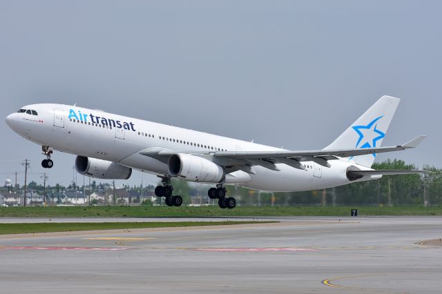 Airbus A330-200 (C-GJDA) - Air Transat Airbus A330-243 departing YYC on June 2.