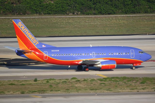 BOEING 737-300 (N505SW) - Southwest Flight 557 arrives on Runway 1R at Tampa International Airport following a flight from Baltimore/Washington International Airport