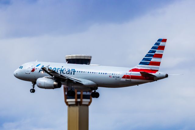 Airbus A320 (N673AW) - An American Airlines A320 landing at PHX on 2/23/23. Taken with a Canon R7 and Canon 100-400 EF ii lens.