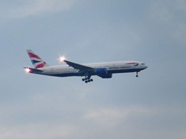 Boeing 777-200 (G-YMMB) - Standing in church parking lot approximately 2.8 miles from aircraft. On final to GSP in the waning light, Sunday Sep 19th.
