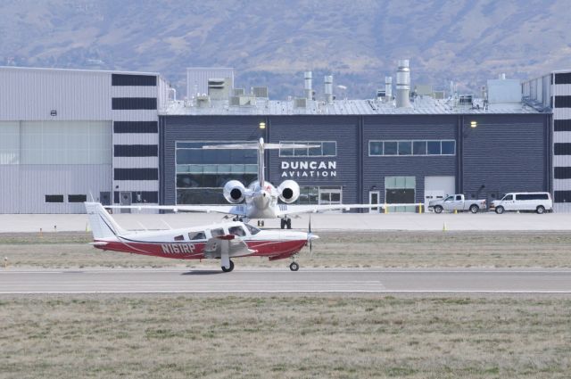 Piper Saratoga/Lance (N161RP) - Taking off with Global (N142QS) in the background at Duncan Aviation.br /Best viewed in full!