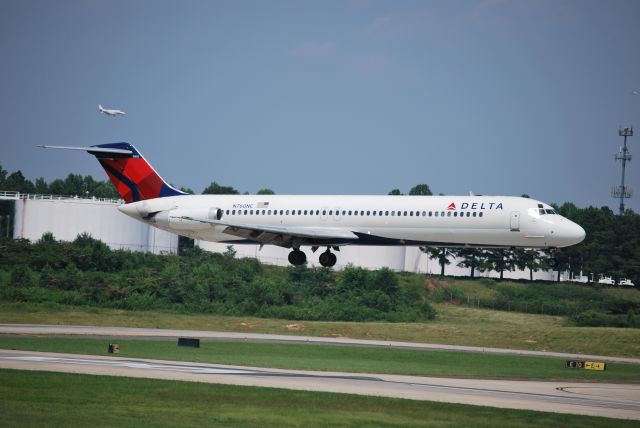 McDonnell Douglas DC-9-50 (N760NC) - Arriving runway 18C, with a Citation 560XL on approach to runway 18L in the background - 6/28/09