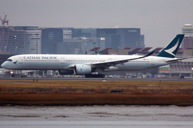 Airbus A350-1000 (B-LXI) - Cathay Pacific departing BOS for Hong Kong during the afternoon on 12/31/21. Usually, they operate during the night so this was a nice surprise. 